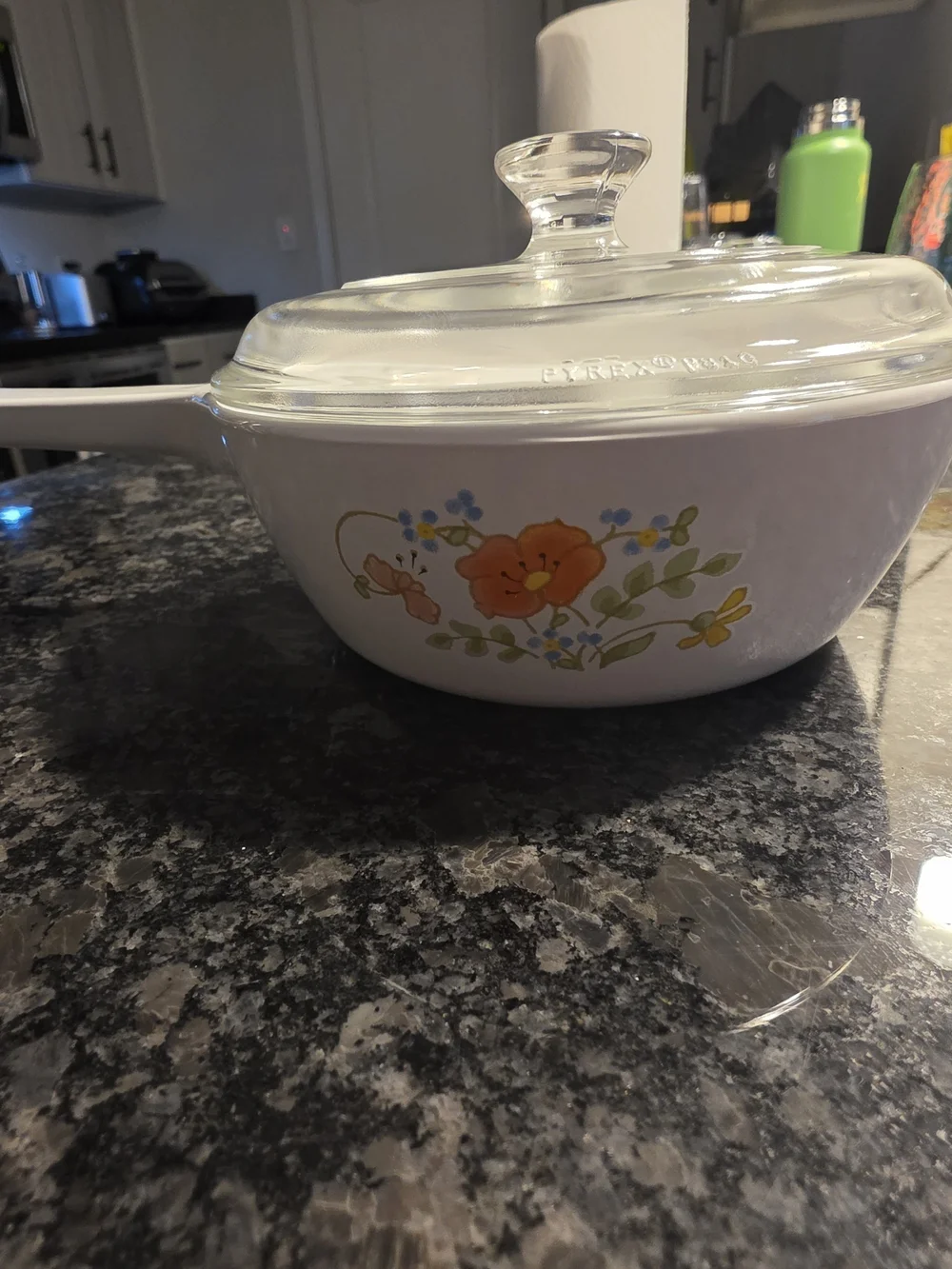 The Corning Ware Wildflower Saucepan/Skillet with Pyrex Lids.